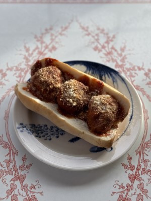 Crispy breaded chicken cutlet, marinara sauce, and melted mozzarella, served on toasted ciabatta with a sprinkle of fresh basil.
