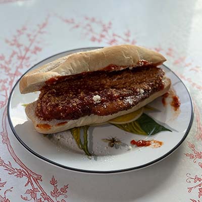 Crispy chicken cutlet with our signature sauce, Parmesan or Mozzarella Cheese, served on a fresh baked Italian Roll.