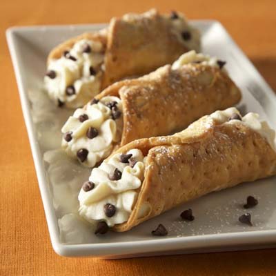 Classic Italian cannoli filled with sweet ricotta cheese