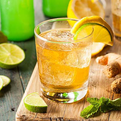 Chilled ginger ale in a glass with ice
