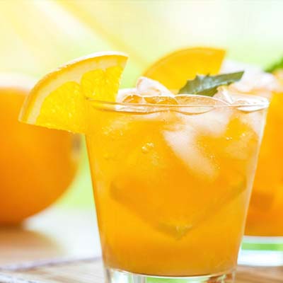 Bright orange soda served over ice
