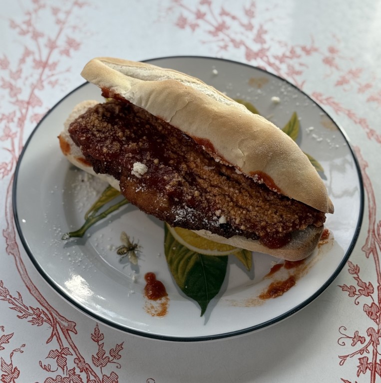 Crispy chicken cutlet with our signature sauce, Parmesan or Mozzarella Cheese, served on a fresh baked Italian Roll.
